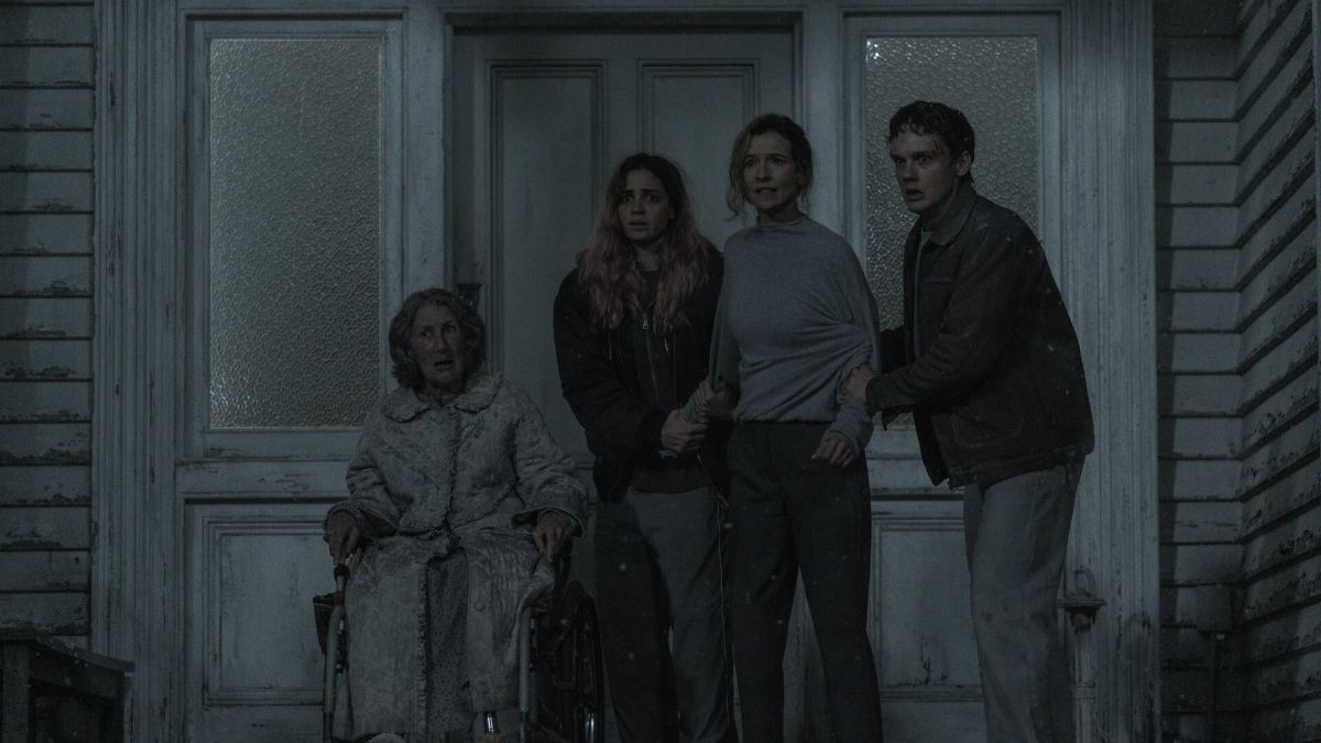 Promotional still of the Price family from Evil Dead Burn standing outside their home.